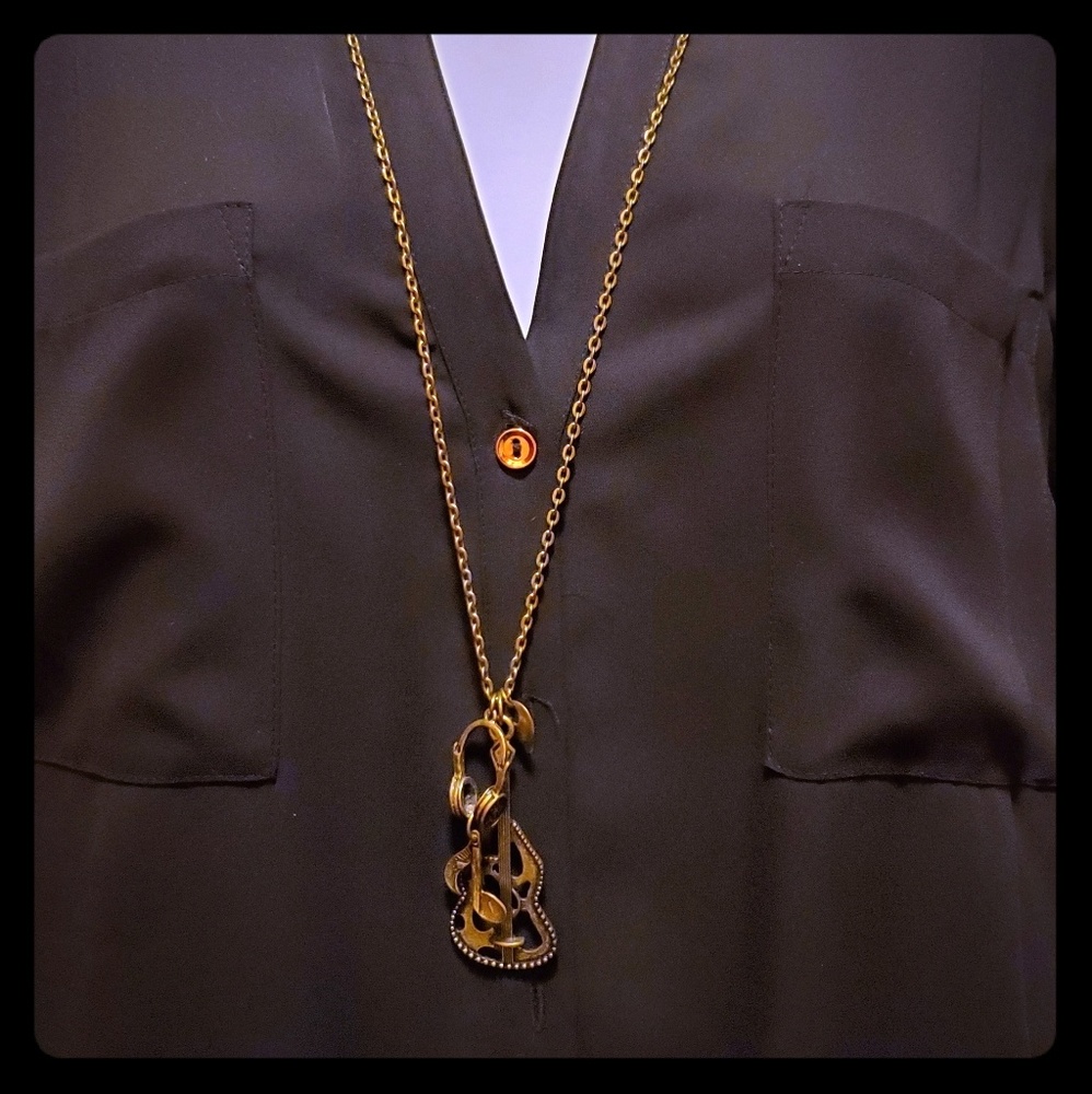 Whimsical fashion long necklace in bronze